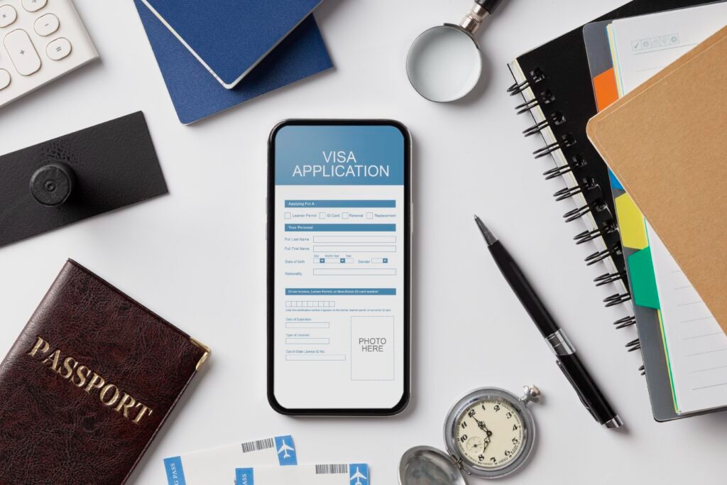 Visa application form on a smartphone with a passport and a magnifying glass